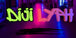 Neon sign with 'Diji Lyp' in colorful letters on a dark background