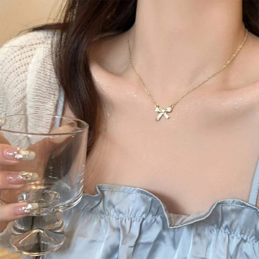 Exquisite Copper Inlaid Zirconia Bow Pendant Necklace for Women