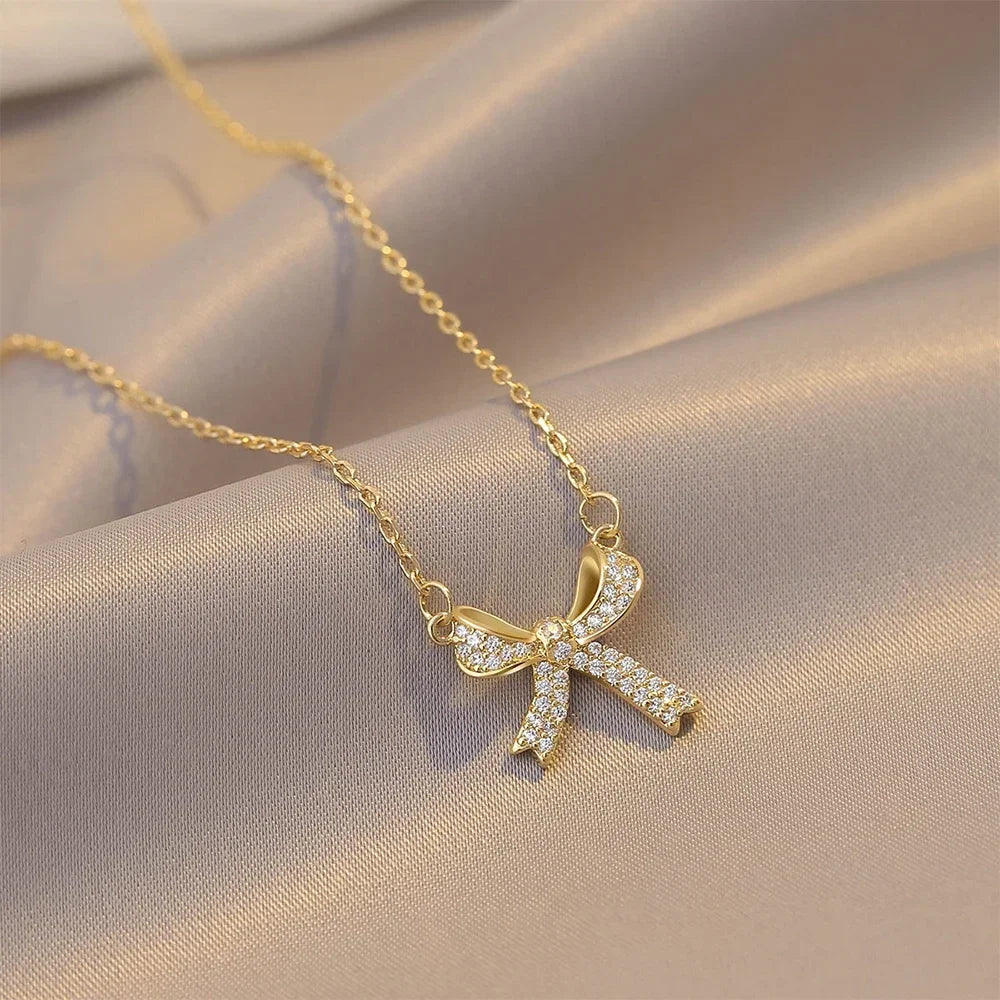Exquisite Copper Inlaid Zirconia Bow Pendant Necklace for Women