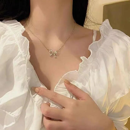 Exquisite Copper Inlaid Zirconia Bow Pendant Necklace for Women