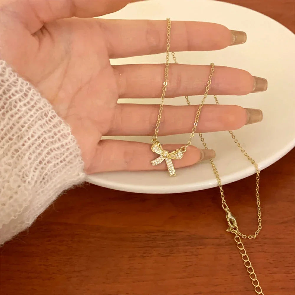 Exquisite Copper Inlaid Zirconia Bow Pendant Necklace for Women